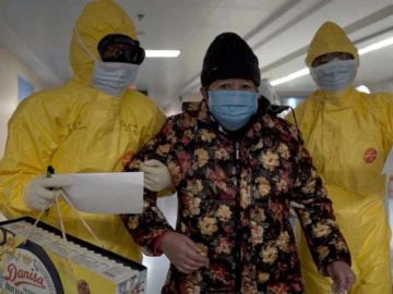 A still from the documentary 76 Days showing medical workers limiting the number of patients admitted into a hospital during the peak of the COVID-19 outbreak in Wuhan, China. (Credit: Courtesy 76 Days LLC)